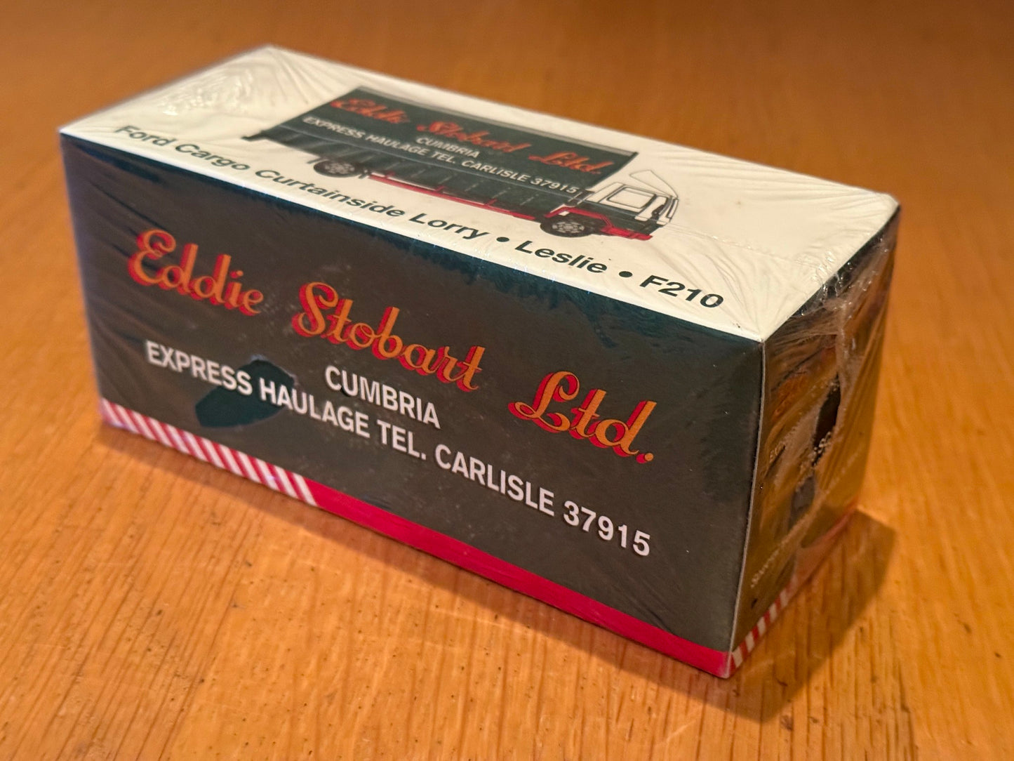 Atlas Editions OO Gauge Eddie Stobart - Ford Cargo F210 Curtainside Leslie BNIB