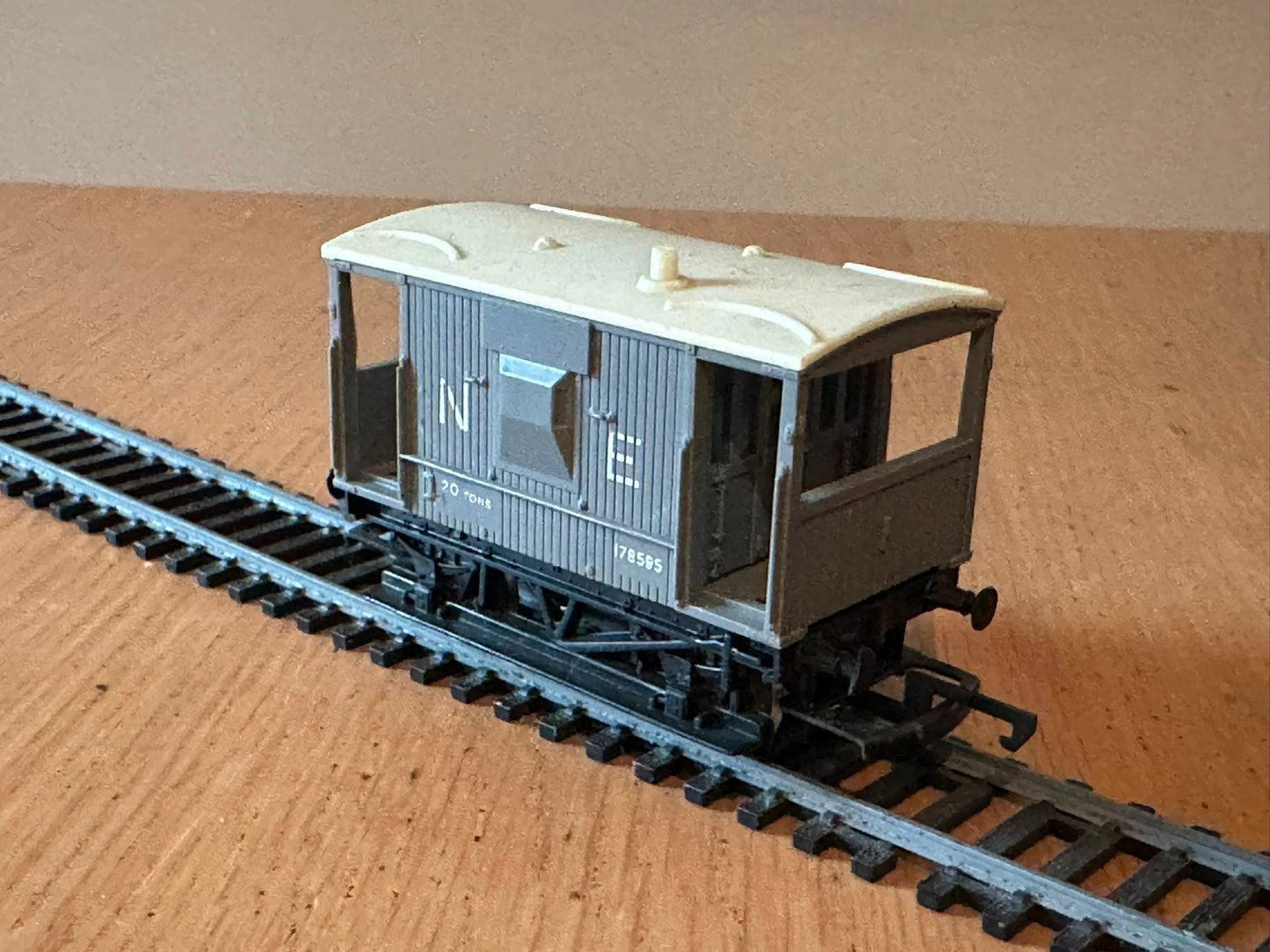 Hornby R114 OO Gauge Short Brake Van in Grey - North Eastern.