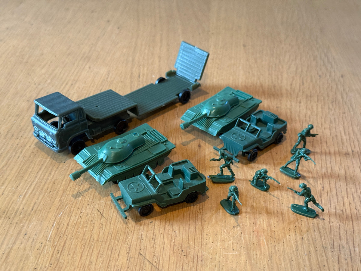 Lot of 1950s? Army Trucks and Soldiers