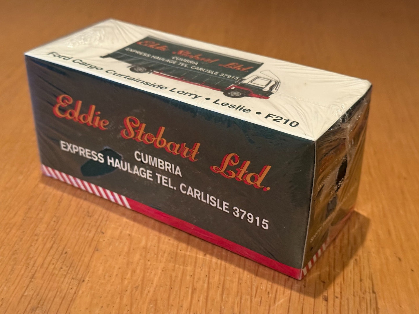 Atlas Editions OO Gauge Eddie Stobart - Ford Cargo F210 Curtainside  Leslie BNIB